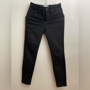 The Authentic Stretch Mid-Rise Skinny in Black